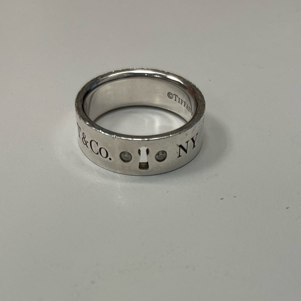 Used and worn Tiffany & co Keyhole double diamond ring